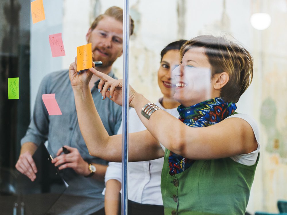 Team collaborates using design thinking techniques